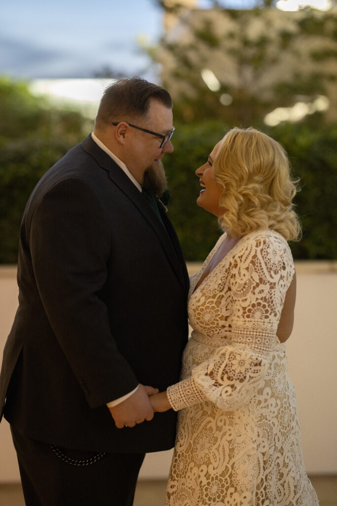 sunset rooftop photos at the end of a wedding day, Alexis Dean photography a Las Vegas based catholic wedding photographer