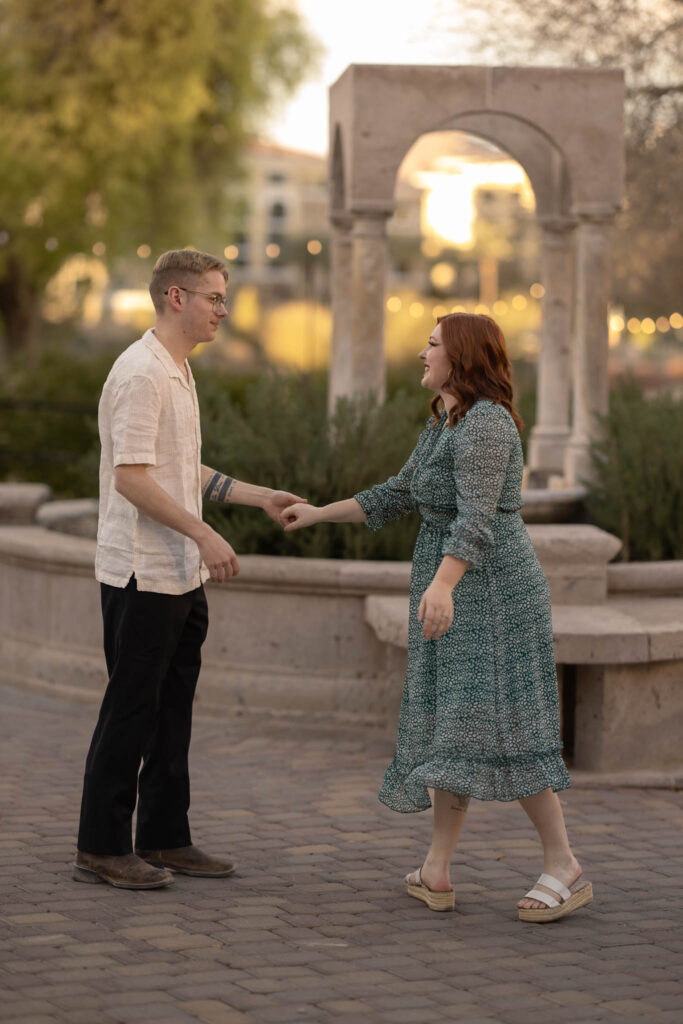 dancing couple with sun setting in the background in lake las vegas with alexis dean photography