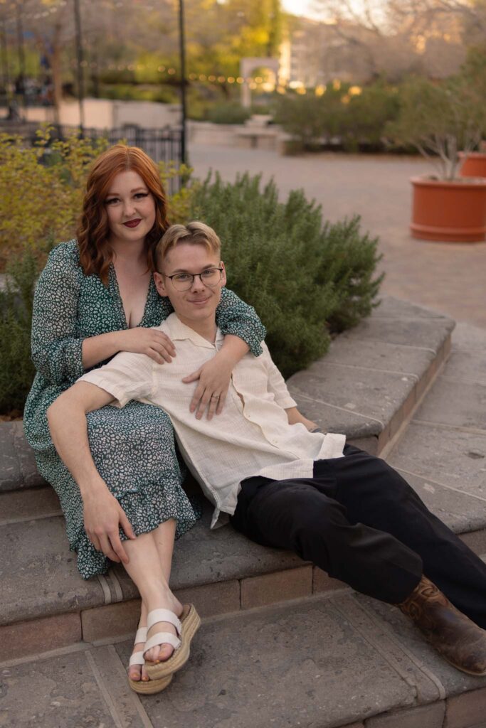 casual sitting photo of husband and wife during their italian date night inspired photo shoot with las vegas photographer alexis dean